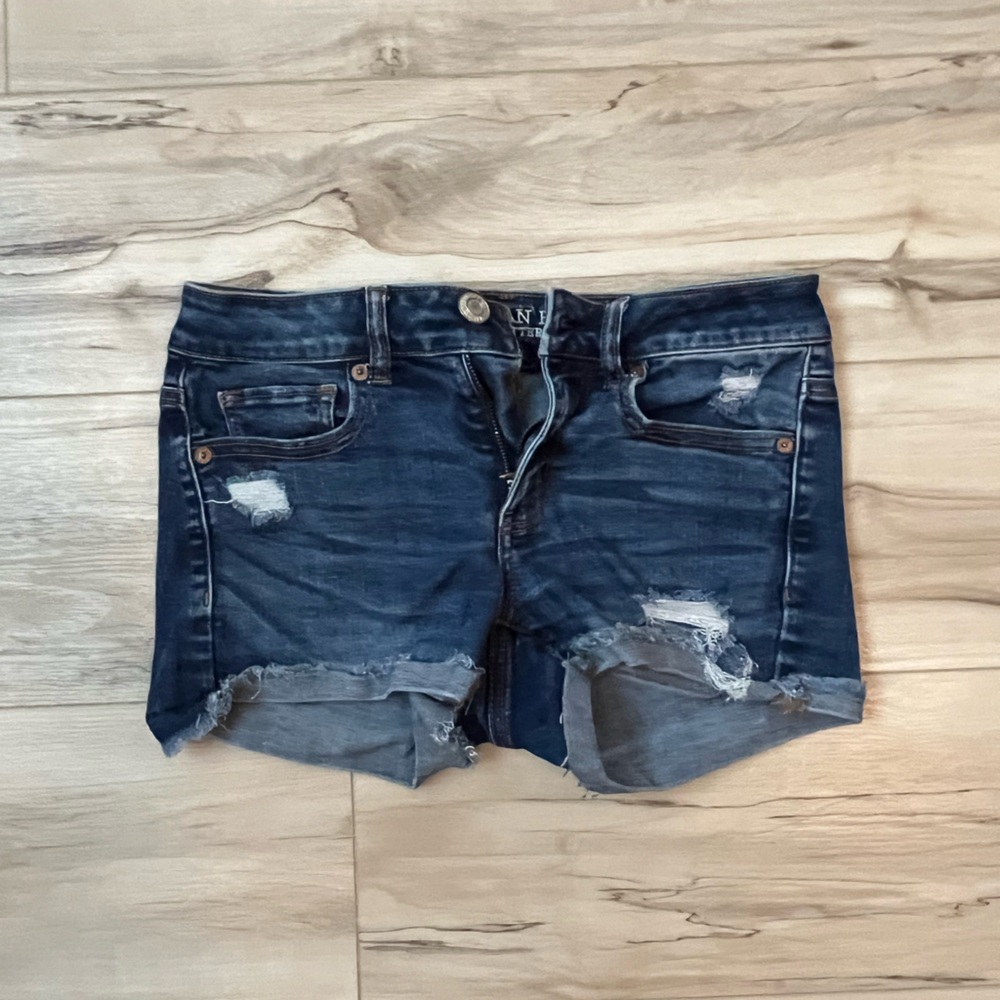 Distressed denim shorts